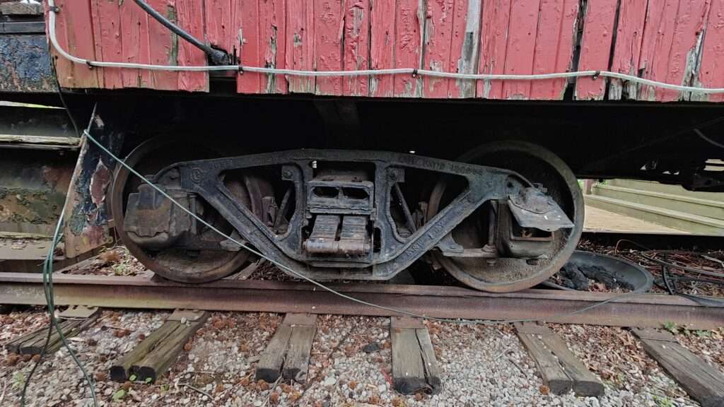 side view of caboose truck with leaf-spring
