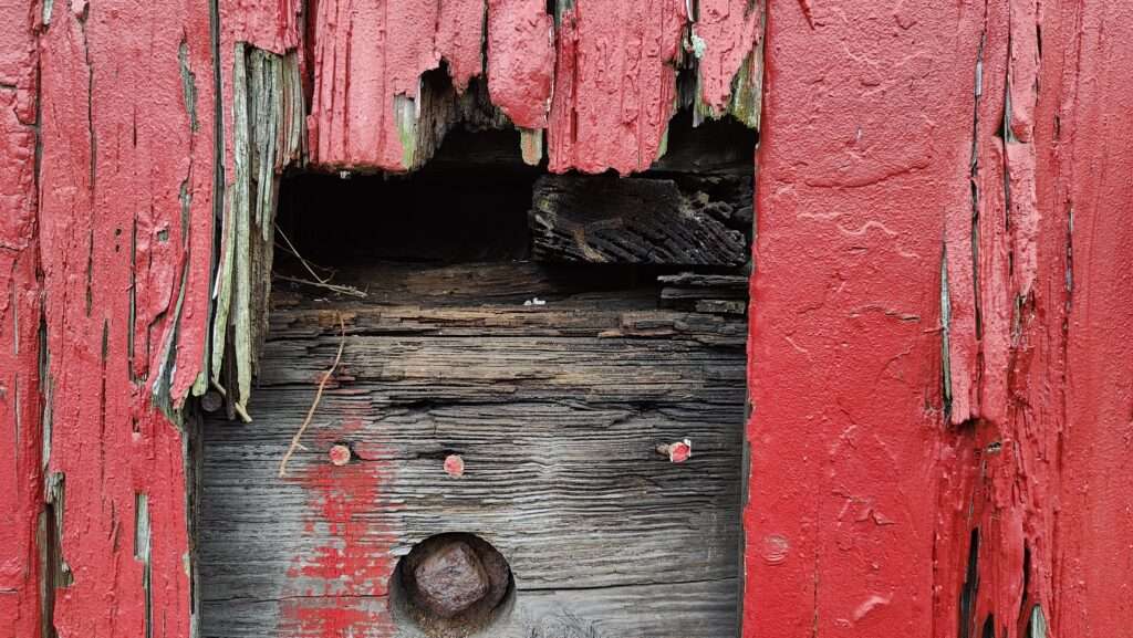 damaged wood on caboose