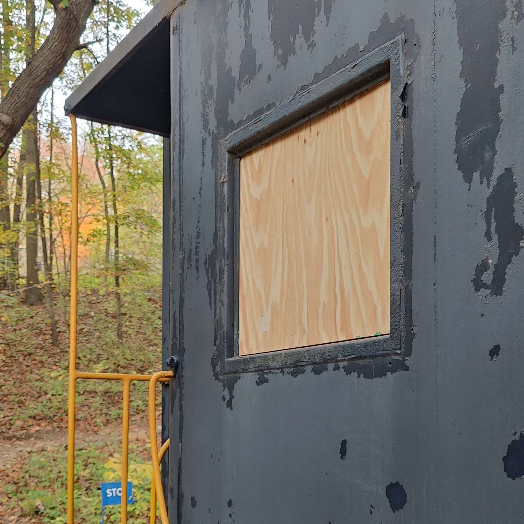 new temporary plywood window sealed for winter